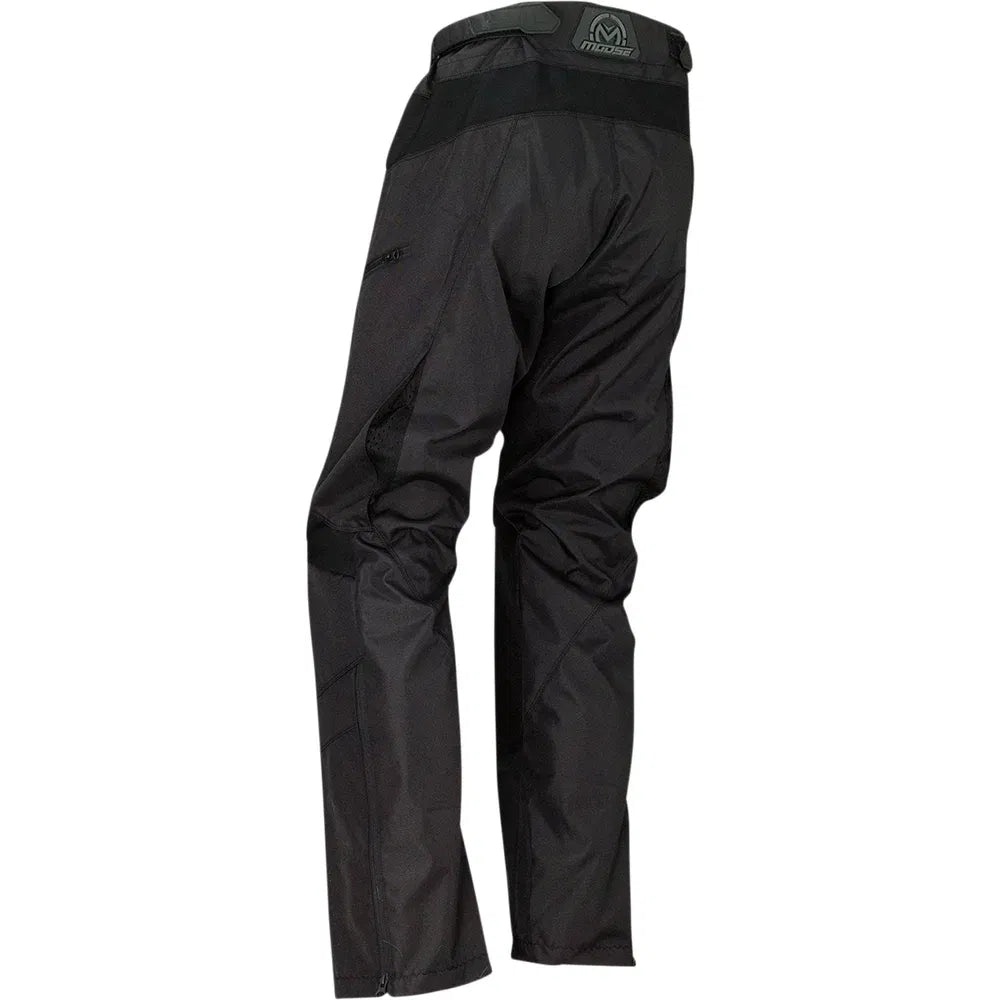 Pantalones por encima de las botas qualifier®