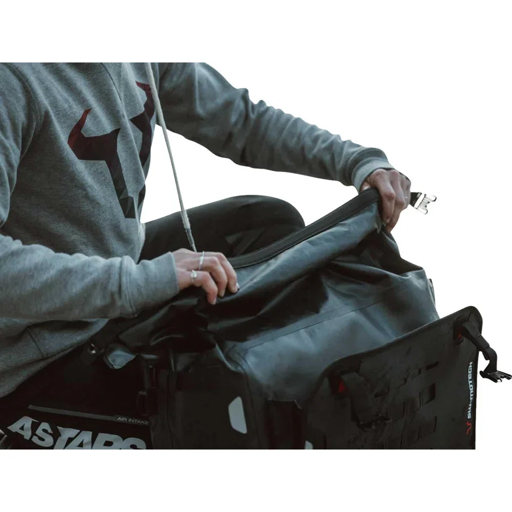 Sistema de bolsas laterales sysbag
